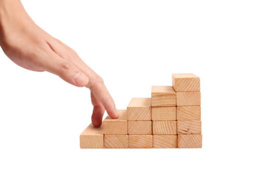 Building success step-by-step progression with wooden blocks indoor workspace conceptual imagery inspirational viewpoint