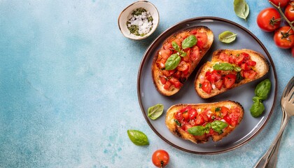 Three slices of bruschetta topped with fresh tomatoes and basil.