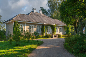 View of Mikhailovskoye estate of the Pushkin Museum-Reserve on a sunny summer day, Pushkinskiye...