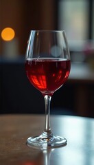 Rich red wine in a crystal glass, reflecting light on polished surface, still life, beverage, tempting