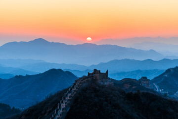 Sunset over the Jinshanling Great Wall, a section of the Great Wall of China built from 1570 CE...
