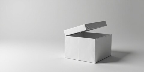 A Partially Opened Plain White Cardboard Gift Box on a White Surface