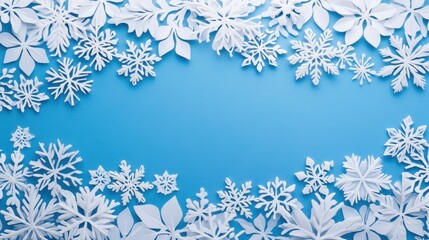 Winter Holiday Background with White Paper Snowflakes Border on Light Blue, Copy Space.