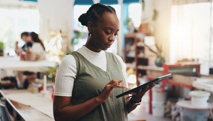 Workshop, woman and research with tablet for pottery, design inspiration or verification for order. Small business, female ceramist and scroll with tech for clay information, track stock or inventory
