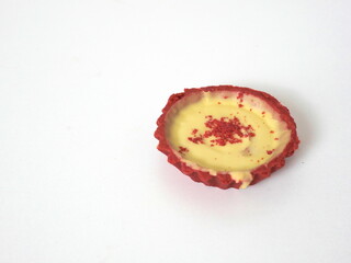 red velvet pie bread with milk cream added in the middle on a white background