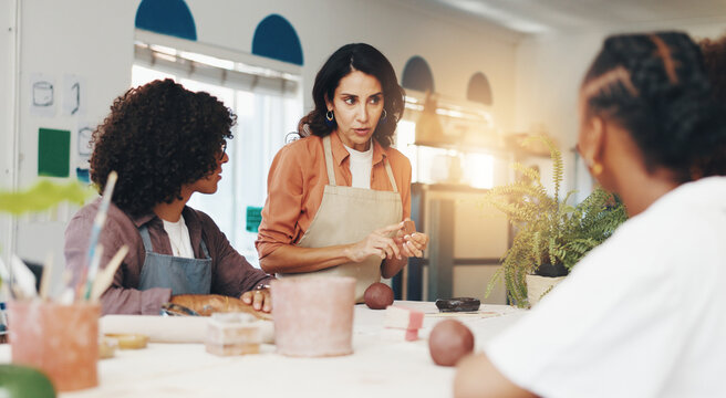 Workshop, people and mentor with clay for pottery, development and creativity with learning in class. Group, students and woman as teacher with sculpture, art design and teaching skills with ceramic