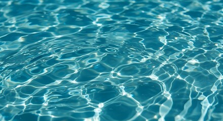 Clear Blue Water with Sunlight Reflections Abstract Texture Background