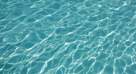Obraz premium Rippling Water Texture with Sun Reflections Creates a Calming Abstract Pattern