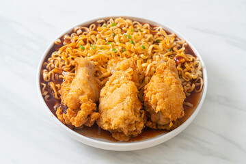 Korean instant noodles with fried chicken or Fried chicken ramyeon