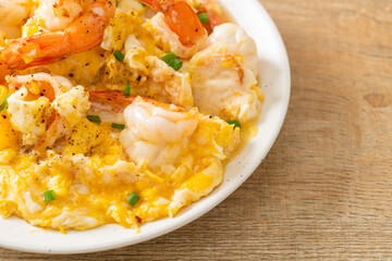 creamy omelet with shrimps or scrambled eggs and shrimps