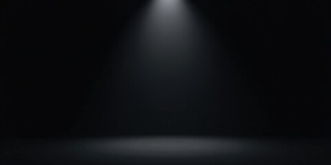 Dark Studio Backdrop  A Single Spotlight Illuminates an Empty Stage, Perfect for Product Displays or Dramatic Visuals