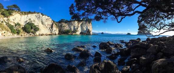 Deep blue ocean and rocky white cliff