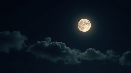 Serene Night Sky A Full Moon Shines Brightly Above a Layer of Dark Clouds