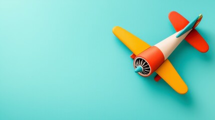 Colorful Toy Airplane Model on Turquoise Background for Creative Imagination and Play