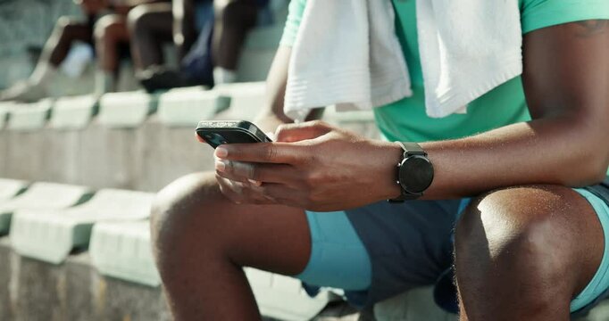 Man, hands or texting with phone at stadium for fitness app, schedule exercise or workout routine. Closeup, male person or runner with mobile smartphone for sport news, training tips or online search