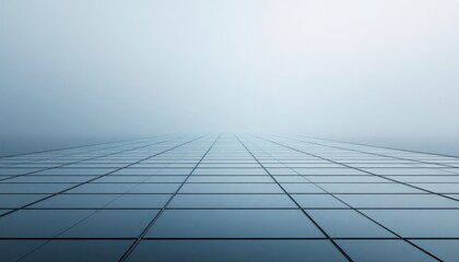 Endless glass facade of modern skyscraper reaching into overcast sky