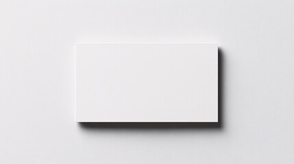 Fototapeta premium white blank business card mockup on white wall background for branding and identity design presentation