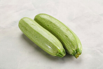 Raw green ripe zucchini vegetable