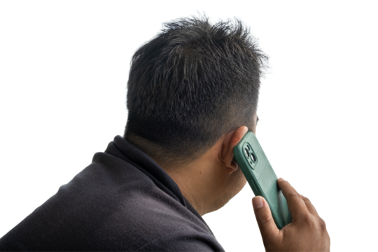 A man with short black hair, seen from behind, holding a green smartphone to his ear as he makes a call against a transparent background. Minimalist and versatile concept.