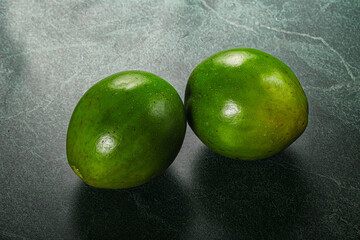 Two ripe green exotic avocado fruit