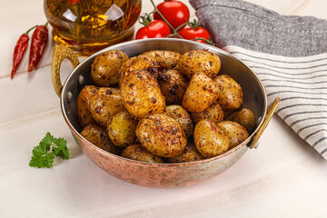 Baked mini potato with herbs