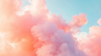 Fototapeta premium Dreamy pink and orange clouds in a blue sky