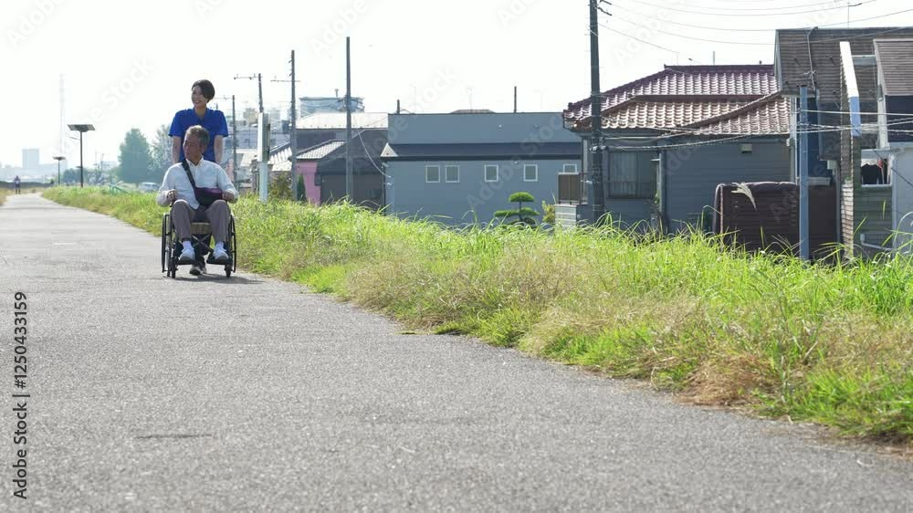 Poster 介護、車椅子、散歩、介護士、ヘルパー、外出、屋外、歩道、サポート、デイサービス、シニア、高齢者、お年寄り、老人ホーム、施設、デイケア、レク、住宅街、公園、道、自然、青空、コピースペース、福祉、ウェルネス、障害、障がい者、ボランティア、女性、男性、日本人、サービス、支援、フレイル、サルコペニア、哀愁、高齢化社会、老後、終活、ホームヘルパー、風景、広角、看護、見守り、リハビリ、介護福祉士、ライフスタイ