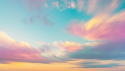 Obraz premium Colorful Pastel Clouds in a Blurred Sky at Sunrise with Soft Natural Light for Dreamy Landscape and Serenity Background Concepts