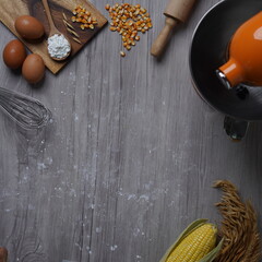 Baking wooden background with organic ingredients on the table, copy space - Square