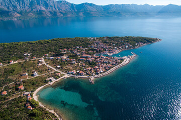 Naklejka premium Scenic Aerial View of Sucuraj Town on Hvar Island, Southern Croatia. Pristine Beaches, Mediterranean Charm, and Adriatic Sea
