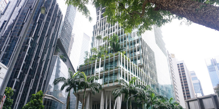 Singapore - January 20, 2025: CapitaSpring skyscraper with unique balcony with trees and plants, Designed by architectural firm BIG and Carlo Ratti