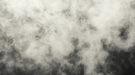 White Smoke Billows Against Dark Background