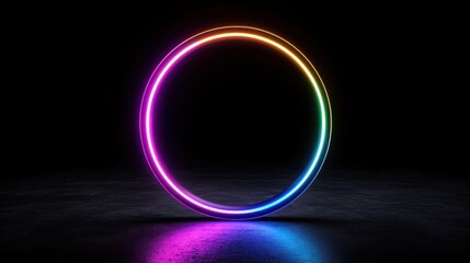 Obraz premium A glowing, colorful circle in a dark setting, creating a striking contrast and an eye-catching visual effect.