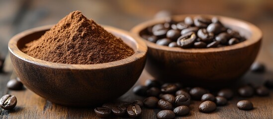 Close-up of instant coffee powder mixed with sugar in a wooden bowl and whole coffee beans in another wooden bowl on a rustic table