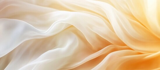 Obraz premium Elegant soft gradient fabric background with flowing textures in creamy and warm tones for luxury and design concepts