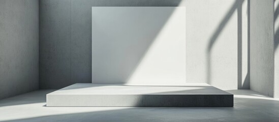 Fototapeta premium Modern minimalist interior showcasing a blank wall and podium illuminated by natural light for creative design projects and promotional content.