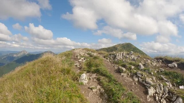 Hiking on Pekelnik hill in Mala Fatra mountains in Slovakia during late summer