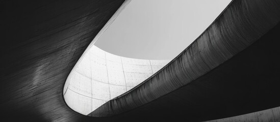 Minimalist futuristic architectural design featuring empty space for text and abstract shapes in black and white tones
