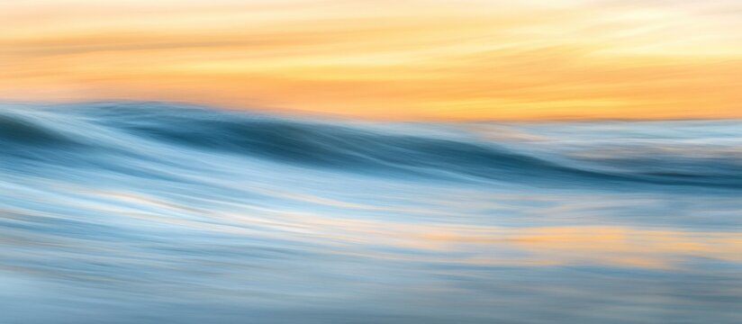 Serene ocean waves at sunrise with soft pastel hues and smooth time-exposure effect creating a tranquil atmosphere.