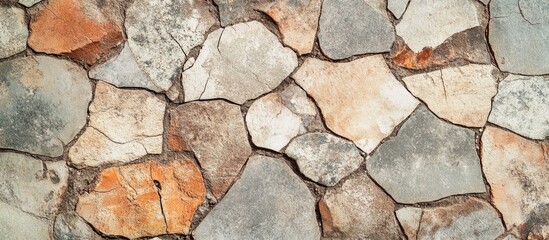 Fototapeta premium textured background of broken floor tiles in various colors and sizes showcasing aged and weathered surfaces ideal for architectural designs