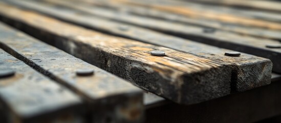 Weathered wooden planks on a rustic zinc surface highlighting texture and aging, perfect for backgrounds or design themes.