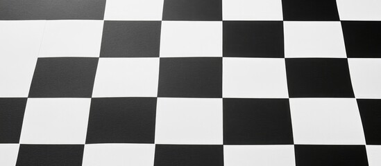 Fototapeta premium Checkerboard pattern of black and white squares isolated on white background suitable for graphic design and game-related projects
