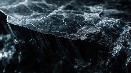 Textured black granite and marble surface with cinematic lighting and intricate details showcasing natural mineral patterns