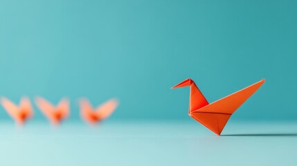 Minimalist Origami Crane Showcase Red Paper Craft on Turquoise Visual Marketing Content for Creative Industries and Bold Design Concepts