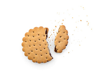 Sandwich cookie with chocolate cream and hazelnuts isolated on white background.