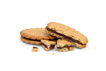 Sandwich cookie with chocolate cream and hazelnuts isolated on white background.