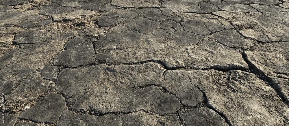 Poster cracked and weathered road surface texture ideal for backgrounds in urban or environmental design pr