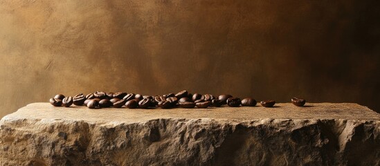Roasted coffee beans elegantly displayed on a stone pedestal against a rich brown background for a warm, inviting atmosphere.