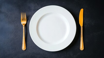 Elegant gold cutlery set against a sleek black background, perfect for luxury dining and table decor.