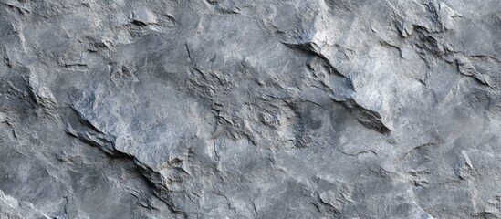 Textured gray stone surface background for design projects, abstract patterns, and natural aesthetics in digital or print media.